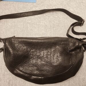 NWOT Latico leather crescent purse. No tears or rips. Perfect condition.